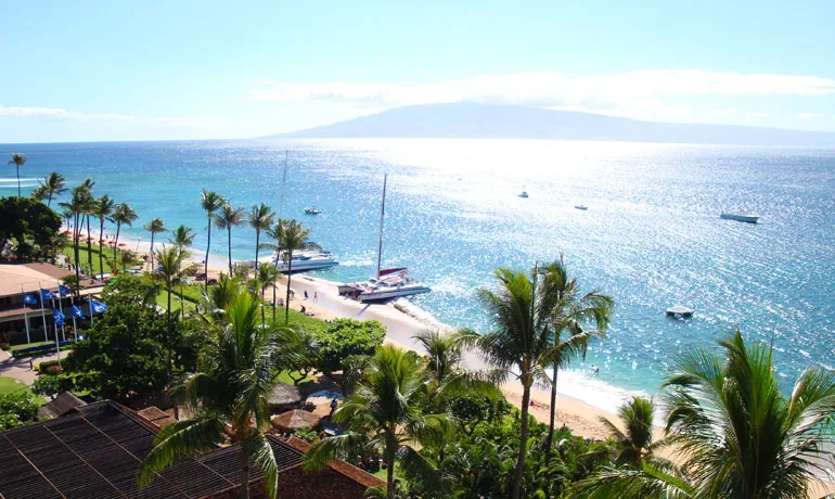 best island in hawaii maui boats on beach