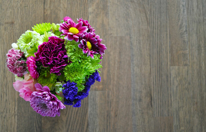 how to stop impulse buying view of colorful flowers on wood floor
