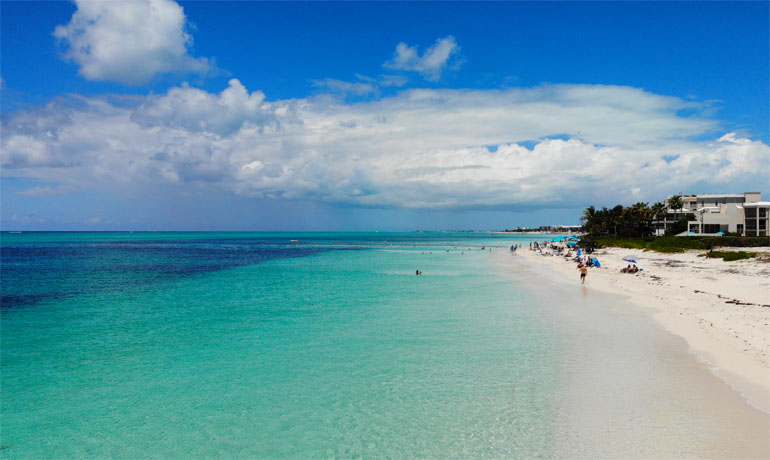 turks and Caicos beach white sand teal water blue sky