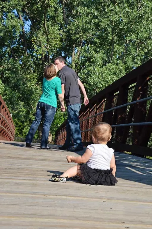 family photos on a bridge in Omaha NE