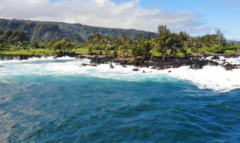 deep blue ocean with Maui in the background