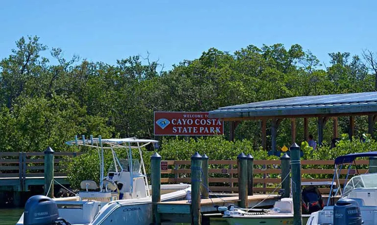 cayo costa state park sign and boats docking