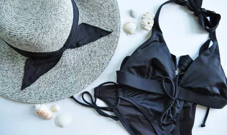 pack a swimming suit and beach hat for your vacation