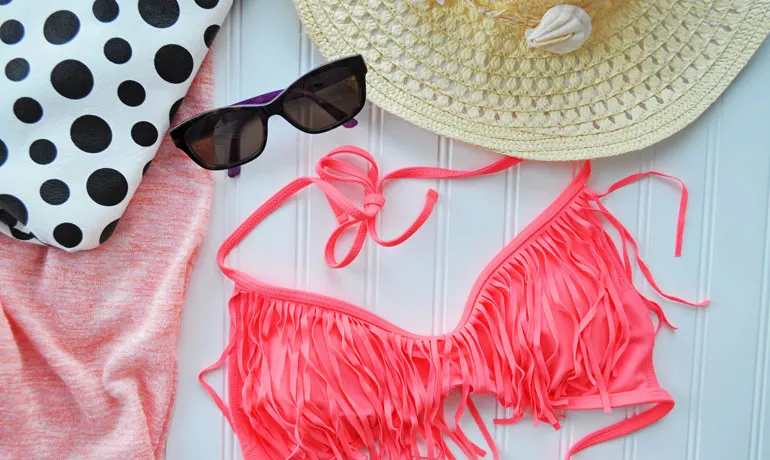 photo of bathing suit, sunglasses, hat