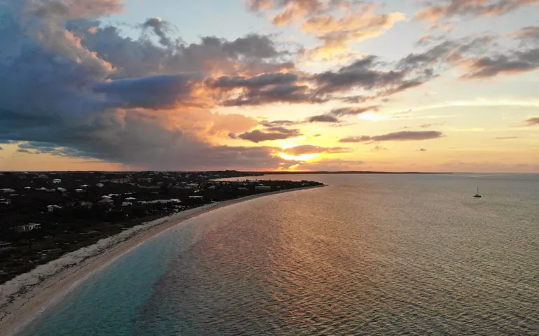 sunset over Bight Beach Turks and Caicos in the distance
