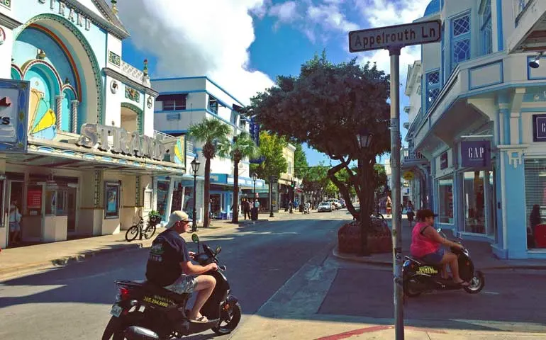 driving around Duval Street with cool buildings in background