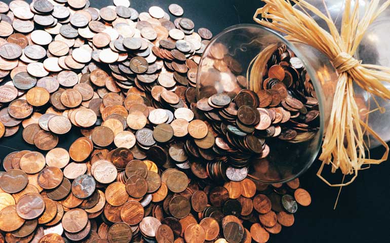 photo of pennies and jar