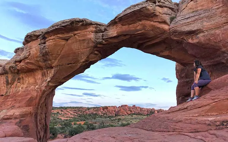 broken arch at sunset