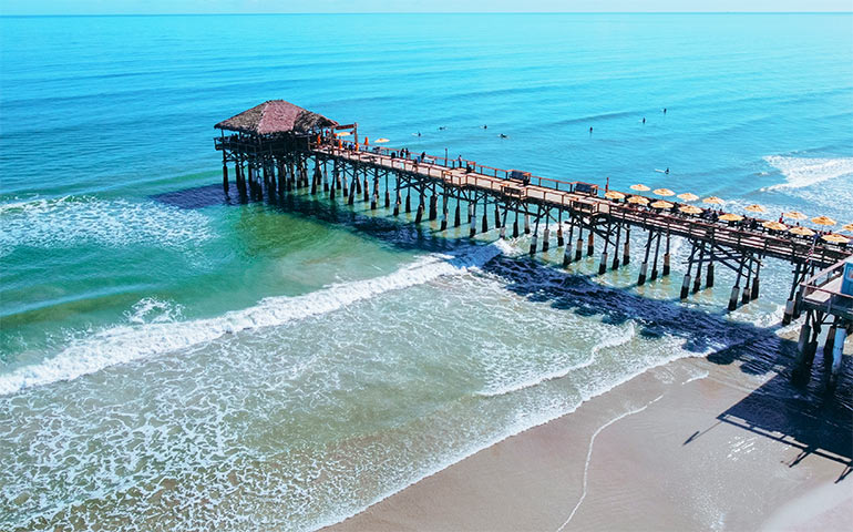 public pier cocoa beach florida with kids aerial view
