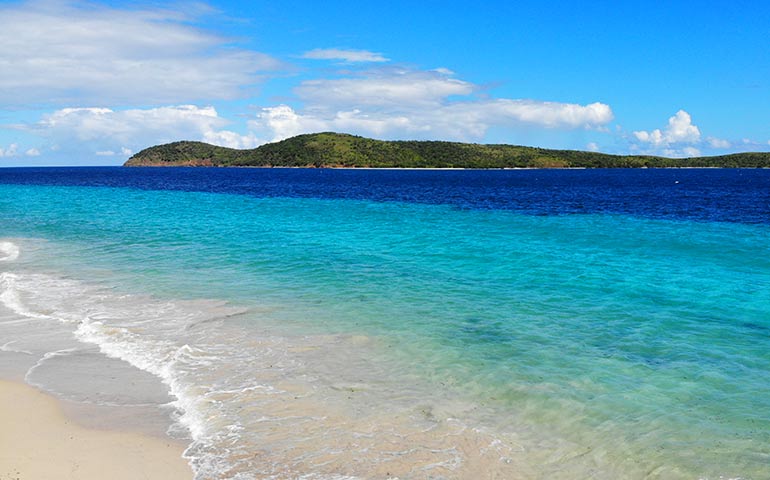 culebra Puerto Rico beach turquoise and blue water, island in background