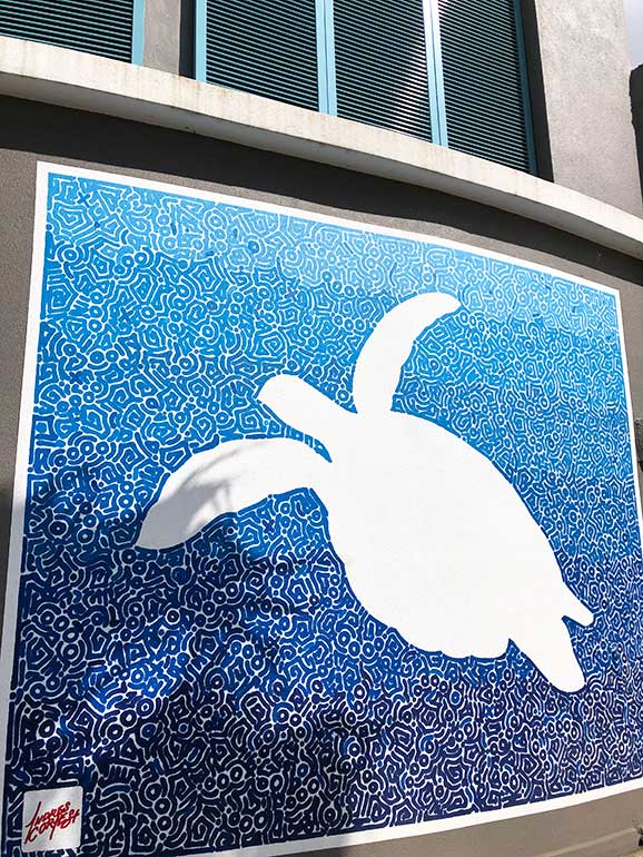 street art in culebra, turtle mosaic blue and white