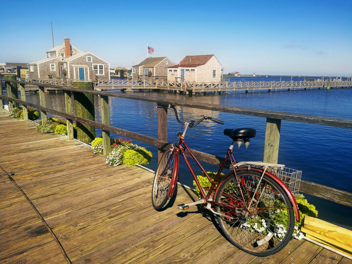 honeymoon destinations usa bike on pier at nantucket overlooking homes on the water