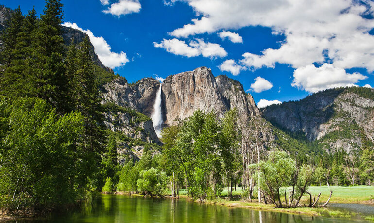 best national parks to visit in April scenic forest, lakes and cliffs