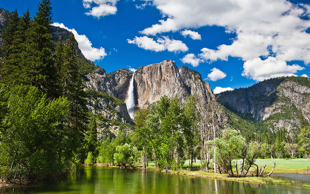 best national parks to visit in April scenic forest, lakes and cliffs