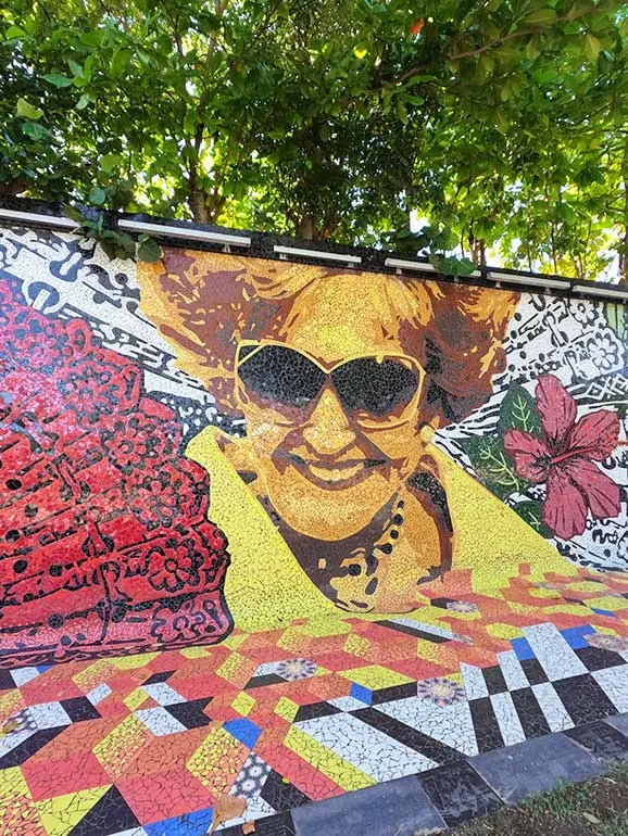 Felisa Rincon de gautier mural colorful mosaic tile of woman's portrait, flowers and more