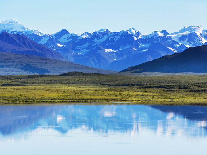 best places to honeymoon in the us - mountains in Alaska with lake in foreground