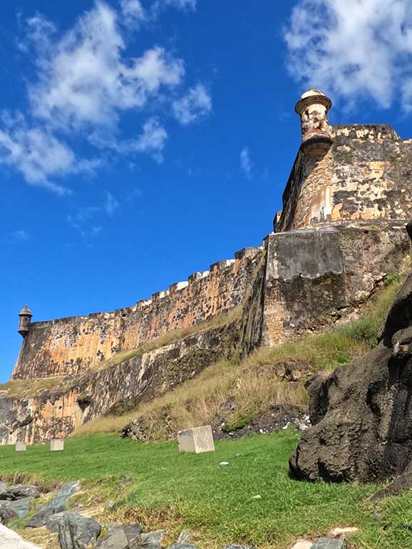 large flat exterior walls with guard tower on the Castillo san Felipe del Morro fort