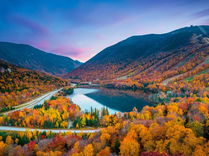 best places to visit in October USA, fall foliage with mountains and lake at sunset