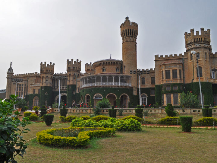 bangalore palace brick and green palace with formal gardens in front India best countries to visit in January