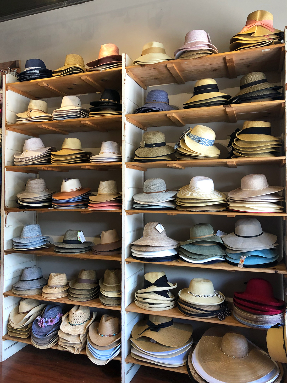 hats stacked on shelves in Lahaina store