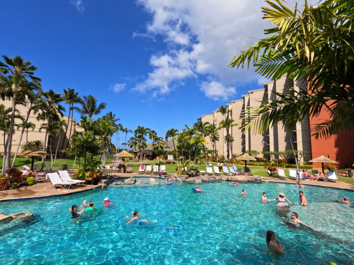 things to do with kids in maui go to the pool view of full swimming pool with palm trees