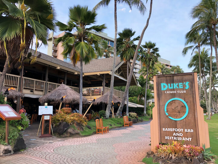 dukes canoe club barefoot bar and restaurant with palm trees and balcony