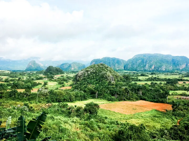 best places to spend Christmas view of rainforest in Cuba with large hills in distance