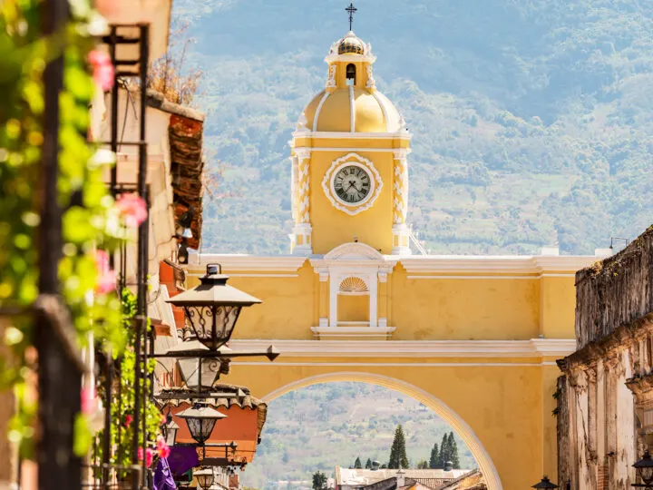 yellow chapel bridge with streets along side Guatemala Central America