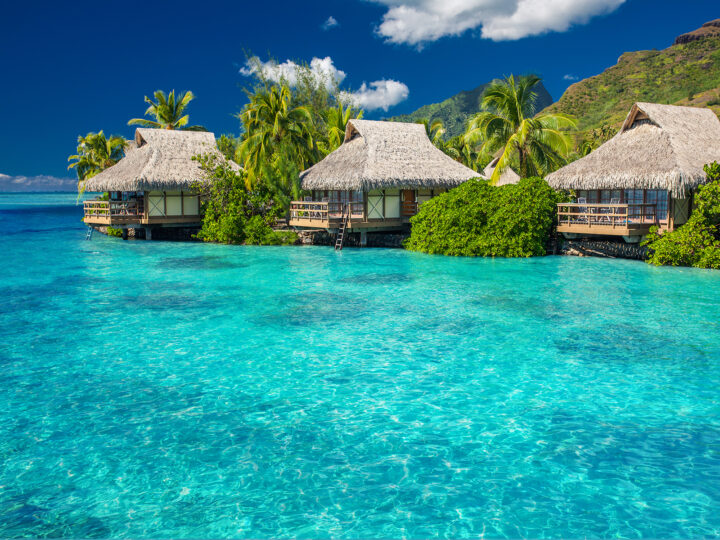 best Christmas destinations moorea huts over teal water