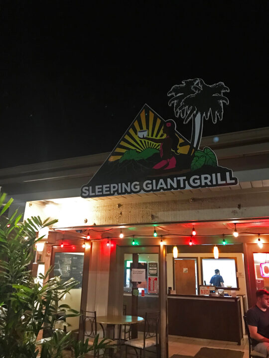 best places to eat in kauai view of sleeping giant grill entrance with holiday lights in the dark