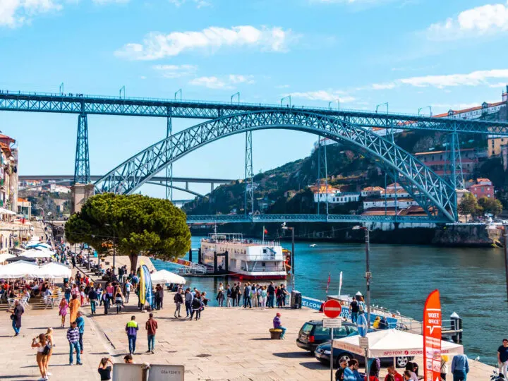 vacation in January to Portugal view of bridge pier boats street vendors