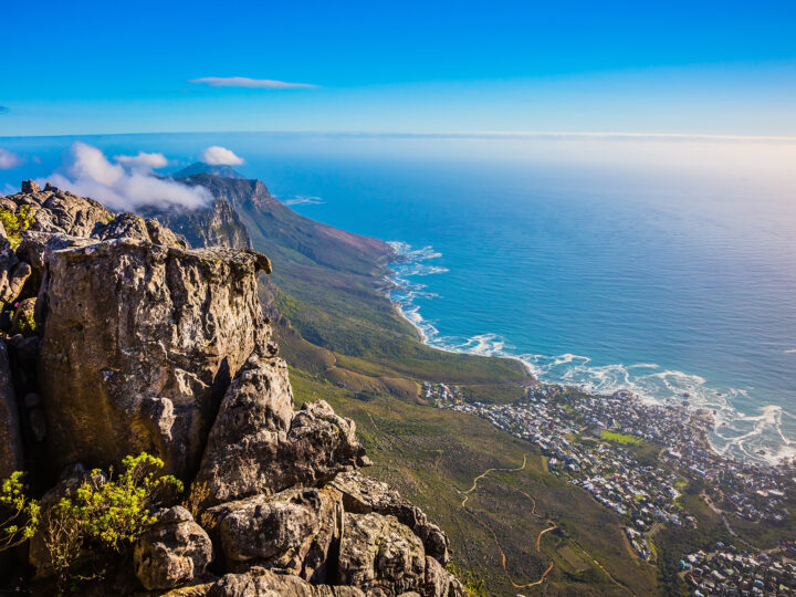 view of mountain ridge with town near coast perfect vacation in january