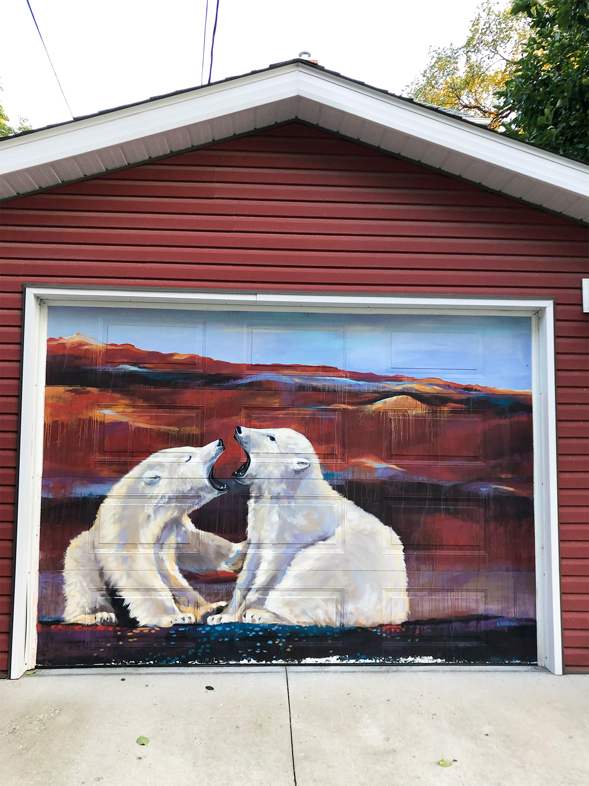 arctic alley winnipeg mural of two polar bears on red garage