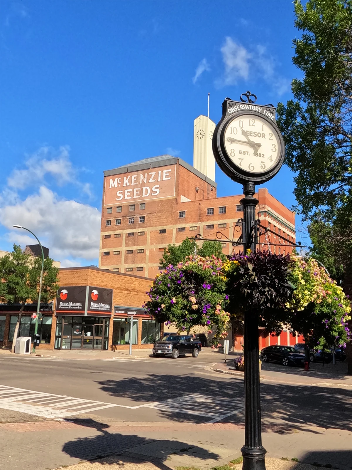 visiting manitoba view of old building small town street and clock