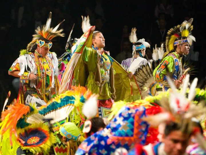 visiting Manitoba dancers at festival wearing intuit clothing