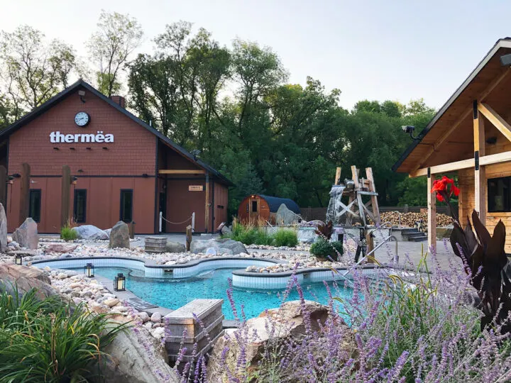 manitoba tourist attractions view of thermea building with large hot tub and landscaping