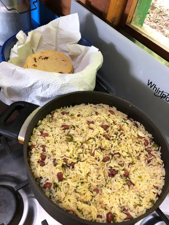 pots with rice and beans and fresh tortillas