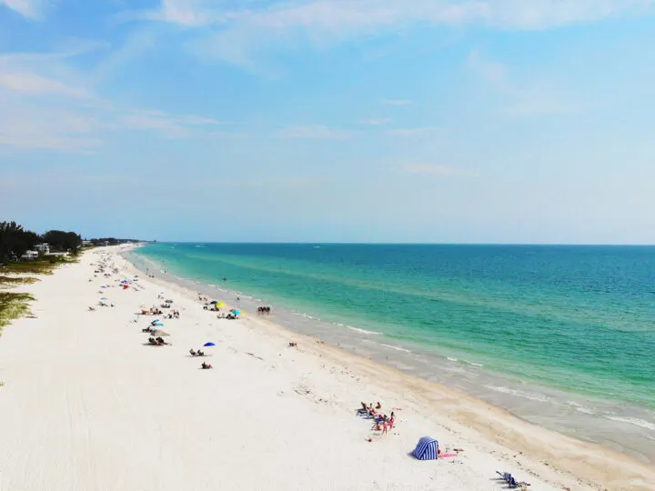warm winter vacations usa view of Anna Maria island beach in florida green water white sand from above