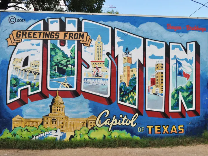 best places to visit in winter USA photo of mural greetings from Austin capitol of Texas with city