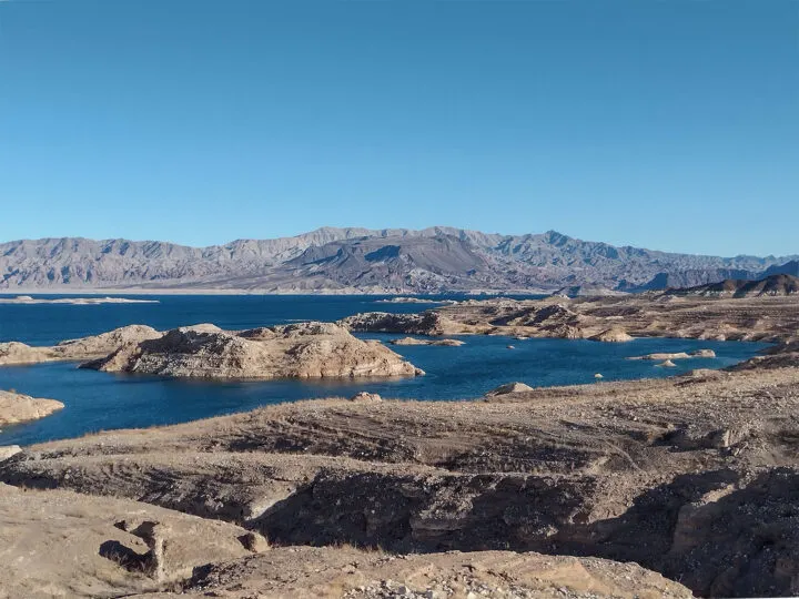 view of Lake Mead blue lake with brown rocks