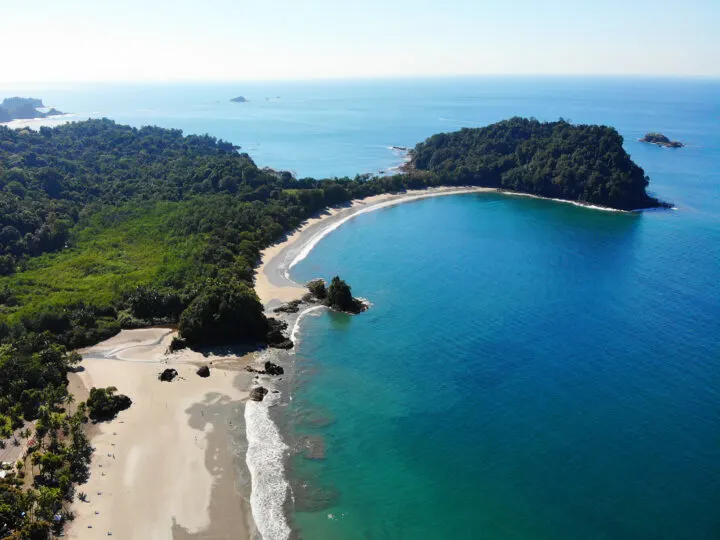 what to do in Manuel Antonio view of blue ocean and lush coastline from above