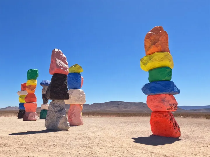 large stacked multicolored painted rocks