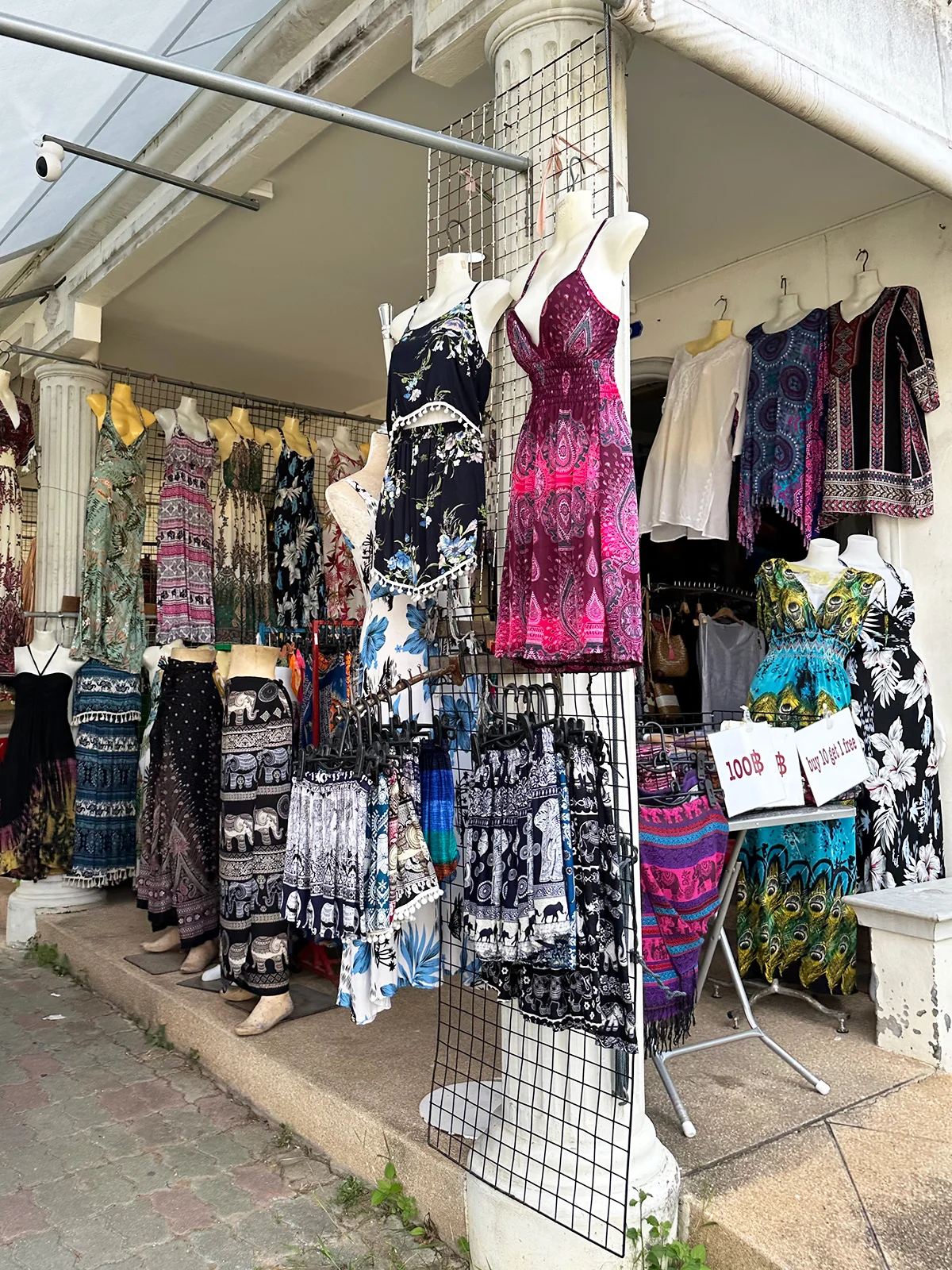 view of multicolored dresses and clothes at store khao lak things to do