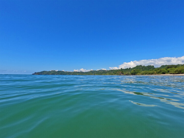 Manuel Antonio tours view of teal water with island in distance