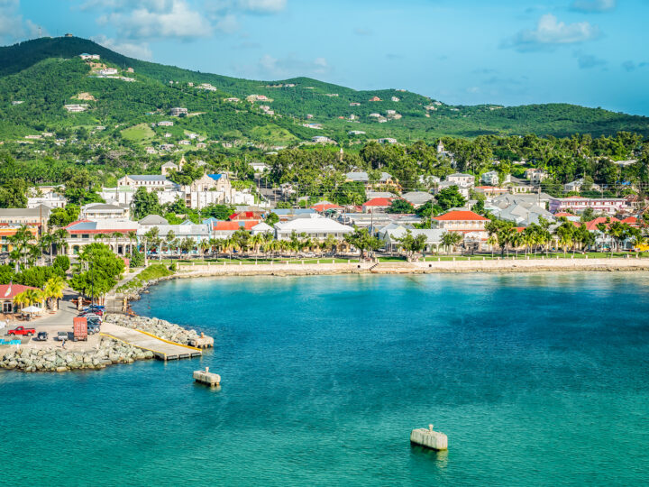 warm winter vacations usa view of port at st croix USVI beach teal water hills and town