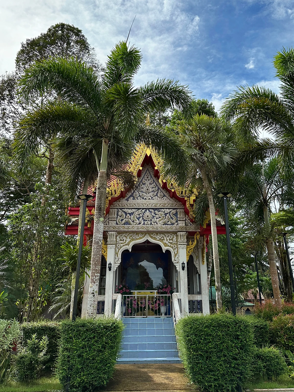 khao lak thailand view of temple in palm trees