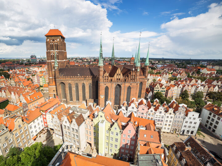 Gdansk Poland view of city from above with orange roof buildings and large cathedral