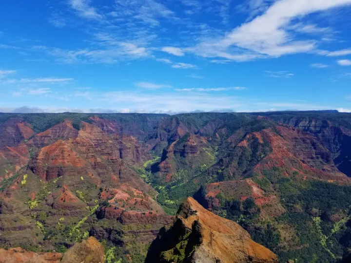 maui or kauai view of mountains red green purple landscape