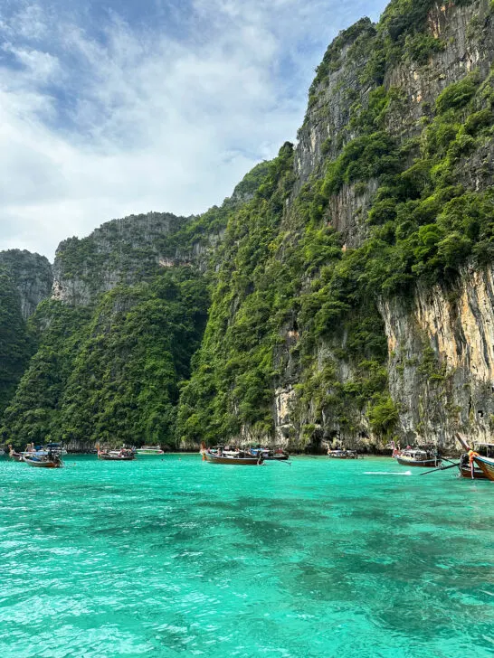 Phi Phi Islands from Phuket view of teal water with greenery limestone cliffs near Maya Bay