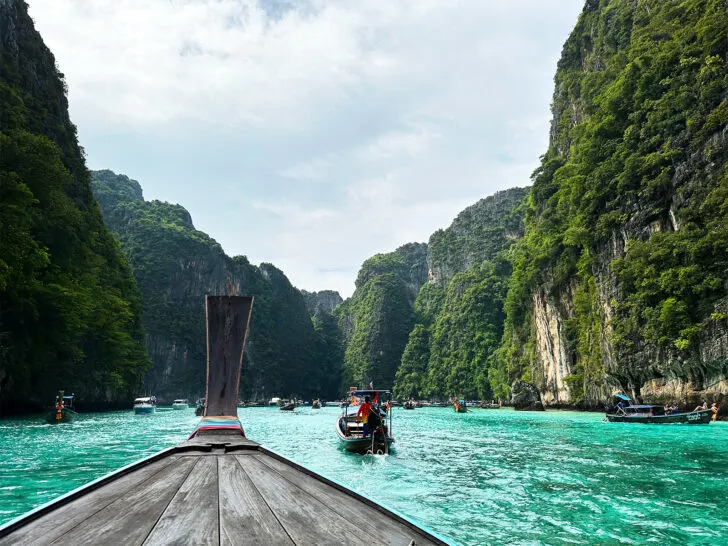 things to do in Phi Phi Islands Thailand view of bay with teal water and green cliffs near Maya Bay